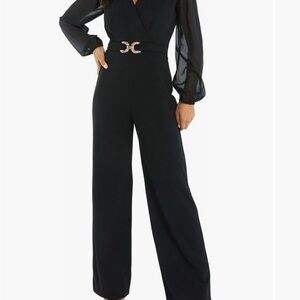 Chic Black Jumpsuit with Sheer Sleeves. New with tags